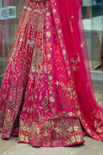 Punch Lehenga Choli In Raw Silk With Colorful Resham Embroidered Spring Blossoms Bridal Lehenga