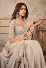 Cream Sequins Embroidered Organza Satin Saree With Embroidery Blouse Piece