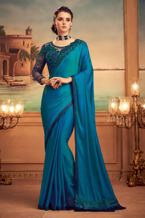 Blue Satin Silk Saree With Embroidered Border And Blouse Piece