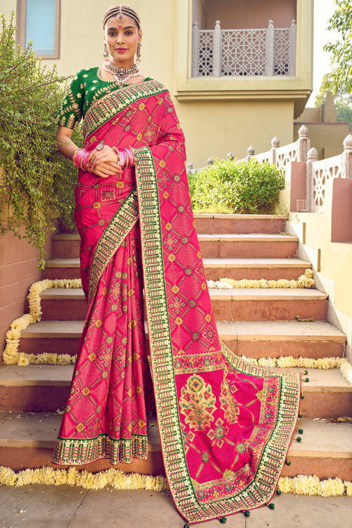 Raspberry Red Bandhej Patola Pure Silk Saree With Embroidered Border Latkan Pallu And Green Embroidered Blouse Piece