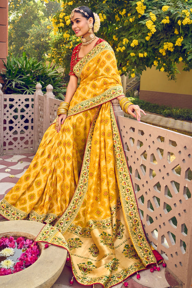 Yellow Pure Georgette & Viscos Bandhani Saree With Border Latkan Pallu And Red Embroidered Blouse Piece