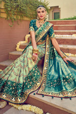 Sea Green Patan Patola Pure Silk Bandhani Saree With Embroidered Border Latkan Pallu And Teal Embroidered Blouse Piece