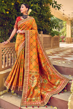 Mustard Bandhej Patola Pure Silk Bandhani Saree With Embroidered Border Latkan Pallu And Red Embroidered Blouse Piece