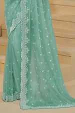 Mint Green Organza Saree With Cutdana Embroidery And Scallop Border