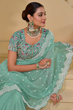 Mint Green Organza Saree With Cutdana Embroidery And Scallop Border