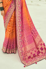 Orange And Rani Embroidered Pure Georgette Jacquard Saree