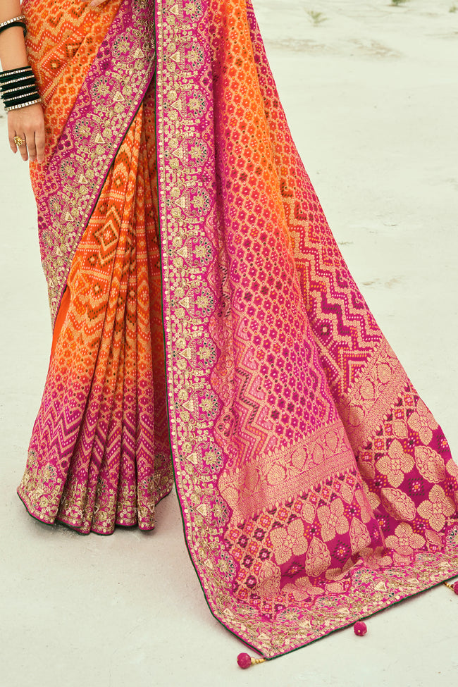 Orange And Rani Embroidered Pure Georgette Jacquard Saree