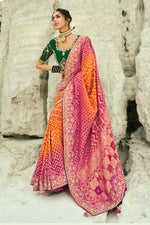 Orange And Rani Embroidered Pure Georgette Jacquard Saree