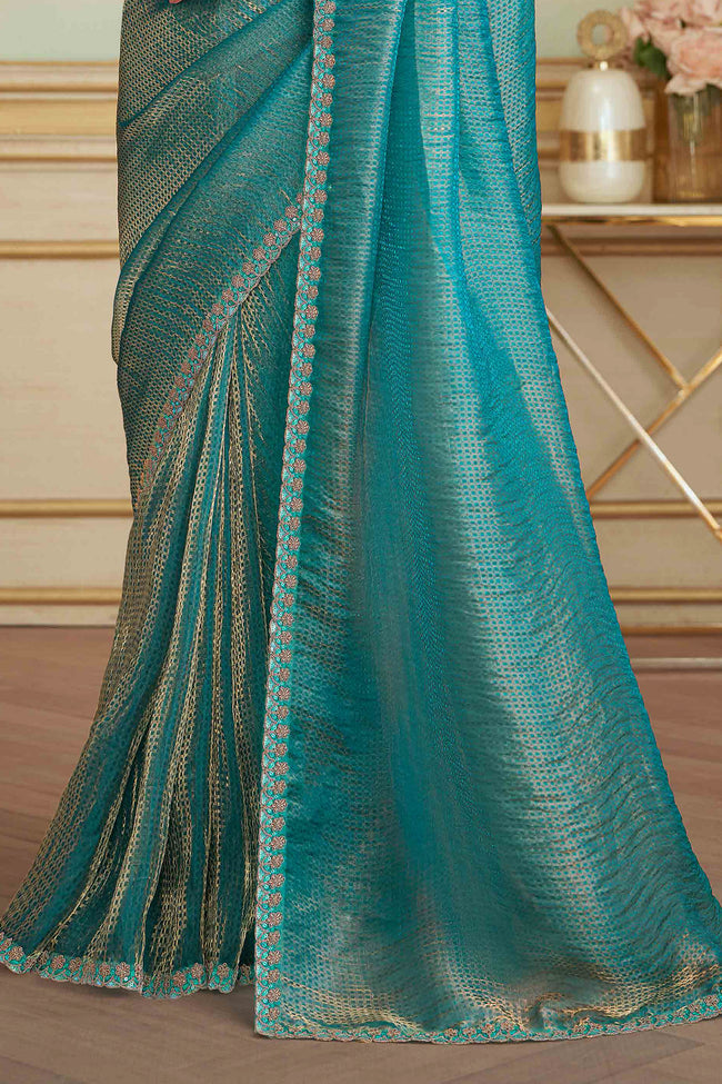 Golden Blue Georgette Embroidered Saree With Blouse Piece
