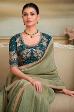 Pista Green Gold Georgette Saree With Embroidered Border