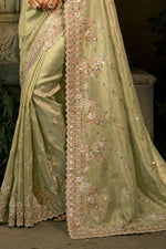 Pista Green Embroidered Silk Saree with Heavy Border Matching Blouse