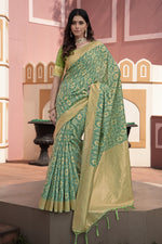 Green Ikat Silk Cotton Saree With Zari Woven Elegance