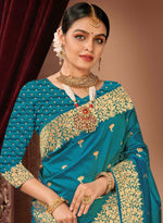 Teal Blue Banarasi Silk Saree With Woven Floral Motifs And Blouse Piece