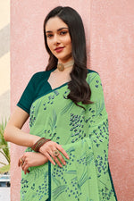 Pastel Green Foil Print Georgette Printed Saree With Fancy Border And Blouse Piece