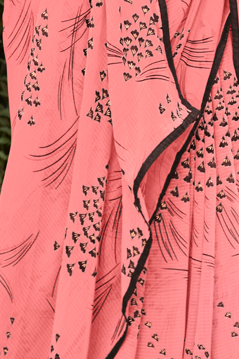 Salmon Peach Foil Print Georgette Printed Saree With Fancy Border And Blouse Piece