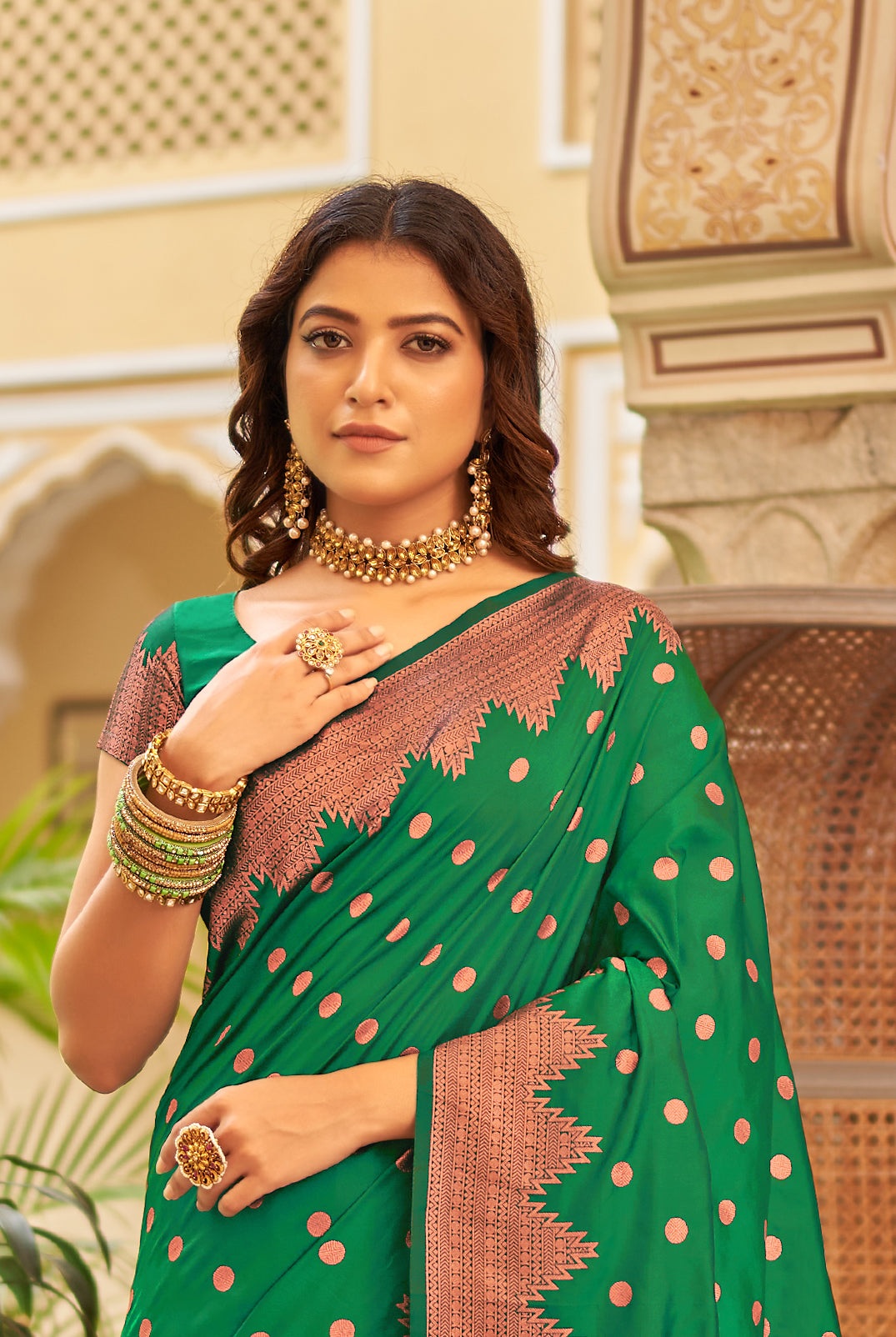 Mahendi green color banarasi silk saree with golden zari weaving work