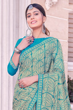 Teal Georgette Printed Saree With Border And Blouse Piece