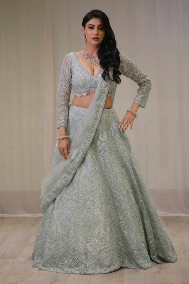Grey Designer Heavy beads Embroidered in Net fabric. Wedding Bridal Lehenga is a traditional attire designed for the bride.