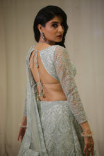 Grey Designer Heavy beads Embroidered in Net fabric. Wedding Bridal Lehenga is a traditional attire designed for the bride.
