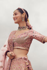 Peach Pink Embroidered Bridal Lehenga With Raw Silk