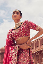 Wine Red Raw Silk Bridal Lehenga With Sequins Embroidered