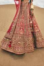 Tomato Red Heavy Embroidered Bridal Lehenga In Raw Silk