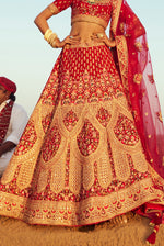 Fiery Red With Golden Bridal Lehenga In Raw Silk With Hand Embroidery